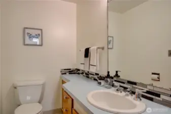 Half bath at the end of the hall.