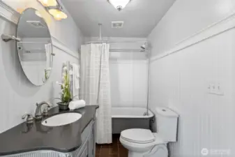 Main floor bathroom showing clawfoot tub/shower.