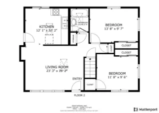 Light-filled main level with open-concept living and dining, a beautifully updated kitchen, and two generously sized bedrooms. The thoughtful layout provides comfort and functionality, with easy flow between common spaces.