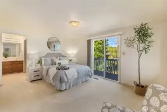 The primary bedroom is on the main level of the home and features a 5-piece bath, walk in closet and a water view!