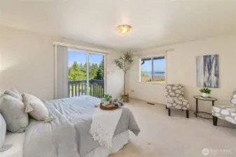 Another angle in the primary bedroom that showcases the water vistas.