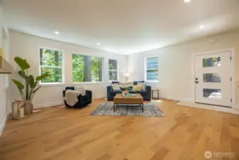 Living room and front entry.