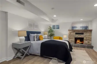 The large lower level bedroom has it's own wood burning fireplace and would be a great Primary bedroom.