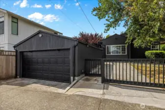 2 car garage with alley access. DADU potential (Buyer to verify)
