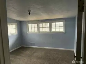 Second upstairs bedroom with so much charm!