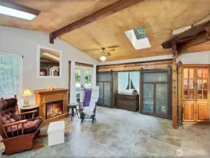 Step through French doors into a spacious, light-filled open layout.