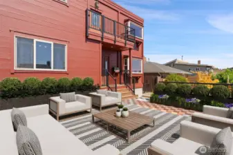 Entry with large patio over the garage - we virtually staged it to give you a sense of the potential!