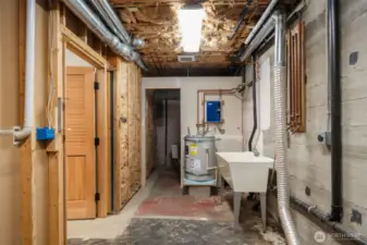 Basement includes original homes floors (to some degree), framework of original bathroom, laundry sink, washer & dryer hookups, newer hot water heater, copper plumbing and more. See home inspection for all the details.