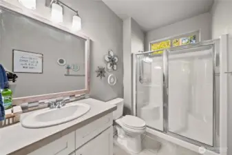 Guest main floor bathroom with a shower