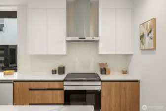 Sleek Samsung Bespoke appliances bring function and flair to this beautifully curated space.