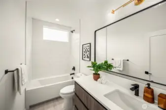 Crisp whites and clean lines create a refreshing space made for mornings on the go and nights winding down.