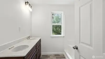 Bathroom with dual sink vanity.