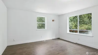 DADU - Bright living area with beautiful flooring.