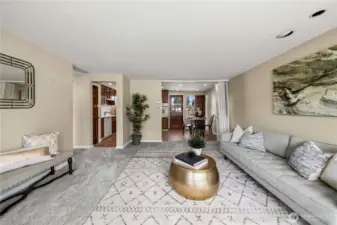Large living room opens to kitchen