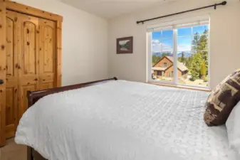 1 of 2 spacious private bedrooms with Cascade mountain views.
