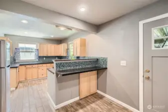 There's even a breakfast bar.  The door on the right leads to the patio and the back yard.