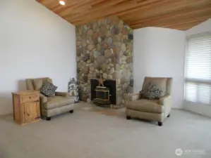 Spacious living room with vaulted ceilings.