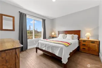 Wake up to spectacular territorial views from this secondary bedroom.