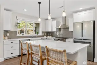 The clean, bright and spacious kitchen is ready for you to cook up the meal of your dreams.