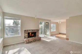 Bask in natural lights that pours in through the windows and overlooks a stately northern red oak!