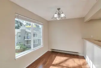 Mealtime made effortless with a breakfast bar & kitchen that opens to the dining area!