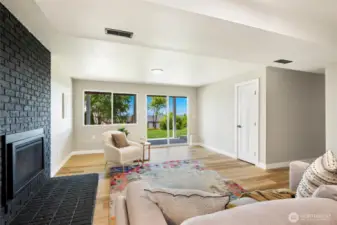 Versatile lower-level living space—perfect as a rec room, media lounge, or multi-generational retreat with direct outdoor access.