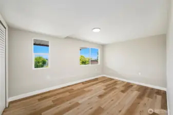 Peaceful and private bedroom with neutral tones and updated finishes—ready for personalization.