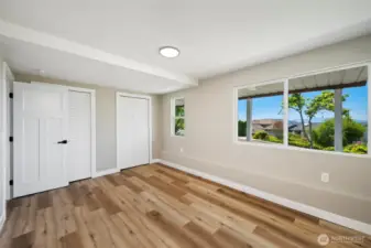 Well-proportioned bedroom with backyard views and flexible layout options.