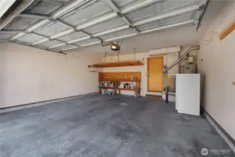 Deep double car garage, freezer included.