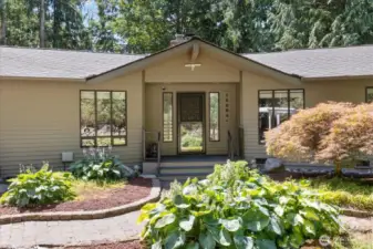 A scenic setting from the moment you step onto the grounds. The park like grounds showcase a 6 car detached garage/shop with power, heat & plumbed for an air compressor, carport, RV parking with a dump station, shop with power & quick connect water access, bird atrium that can easily be converted to a greenhouse, a flex outbuilding to transform into a chicken coop or dog run, 2 stall barn, tree house observatory, garden space & fruit trees. Your attached garage includes a 400 amp panel that's wired for a generator.