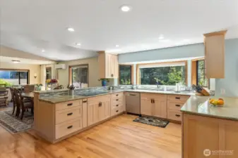 A kitchen designed for hosting! Enjoy holidays, parties and gatherings without missing any of the action in your open kitchen. Craft culinary experiences with a chef's counter, created with bar top seating in your kitchen.