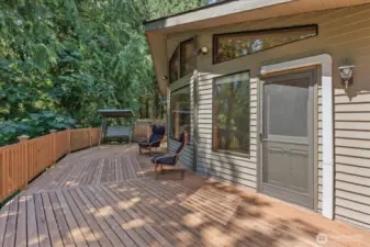 An expansive entertainment deck! Step onto your deck from multiple rooms as your deck runs along the back of your home. Bonus! It was recently redone over the past 2 years.
