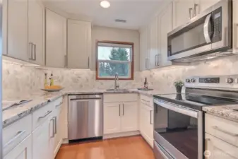 New cabinets, new plumbing, new garbage disposal.