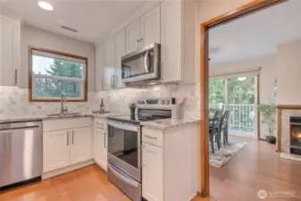 Kitchen open to Living/Dining areas.