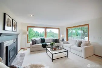 Main Level Family Room Newly Sanded and Stained Hardwood Flooring and Fresh Carpet