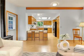 VIRTUALLY STAGED - Family Room features a Free-Standing Propane Stove