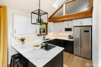 Kitchen fully remodeled in 2020 with marbled quartz countertops.