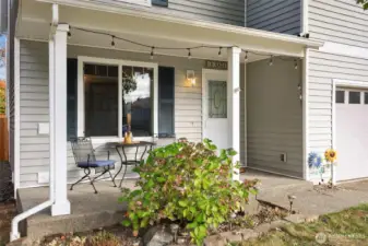 Hydrangeas offer a warm invitation to this covered front porch.