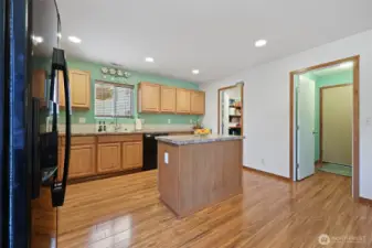 This shows the walk-in-pantry ahead and the mud-room-style entry from the garage (keeping coats and shoes contained!)