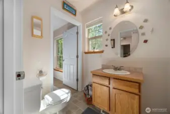 The other full bath that is also upstairs.