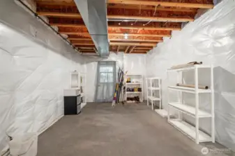 Another view of the unfinished, heated and fully insulated basement.