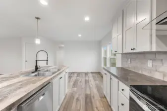 View of the spacious dining room from the kitchen.