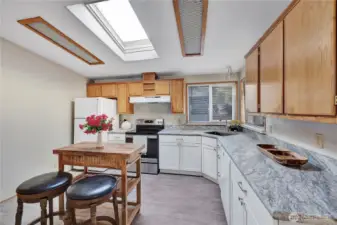 Another view of the kitchen. Plenty of room for a kitchen table or kitchen island.