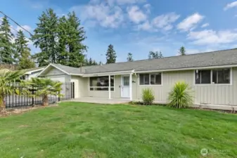 Front yard, real grass, for lower maintence install astrotruf