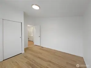 Bedroom 3 with ample closet storage and practical proximity to the full hall bath.