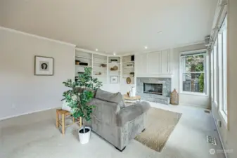 Family Room with gas fireplace, built in shelves