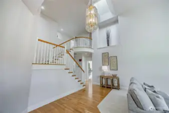 Entry Living Room with Grand Staircase