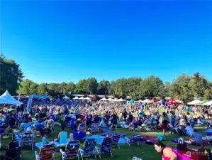 A short 2 miles away - wow! The city of Woodinville, Woodinville Wine Country with over 100 tasting rooms, dining, shopping, grocery, theater and more. Summer events include the weekly "Concert in the Park" on the Sammamish River. Just one of the many free community activities!