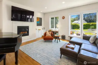 Flexible open space for living with a wall of windows to the private yard.