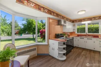 Great breakfast nook with bay window to sit and relax with a cup of coffee.